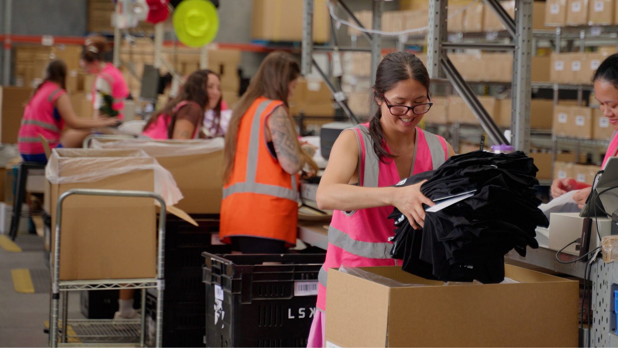 Photo of a woman in warehouse
