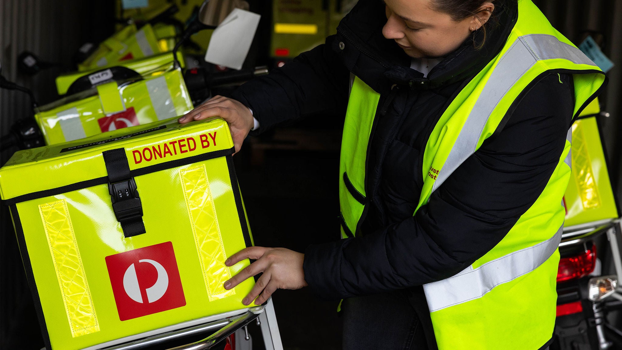 photo-australia-post-donating-equipment-pacific-island-posties