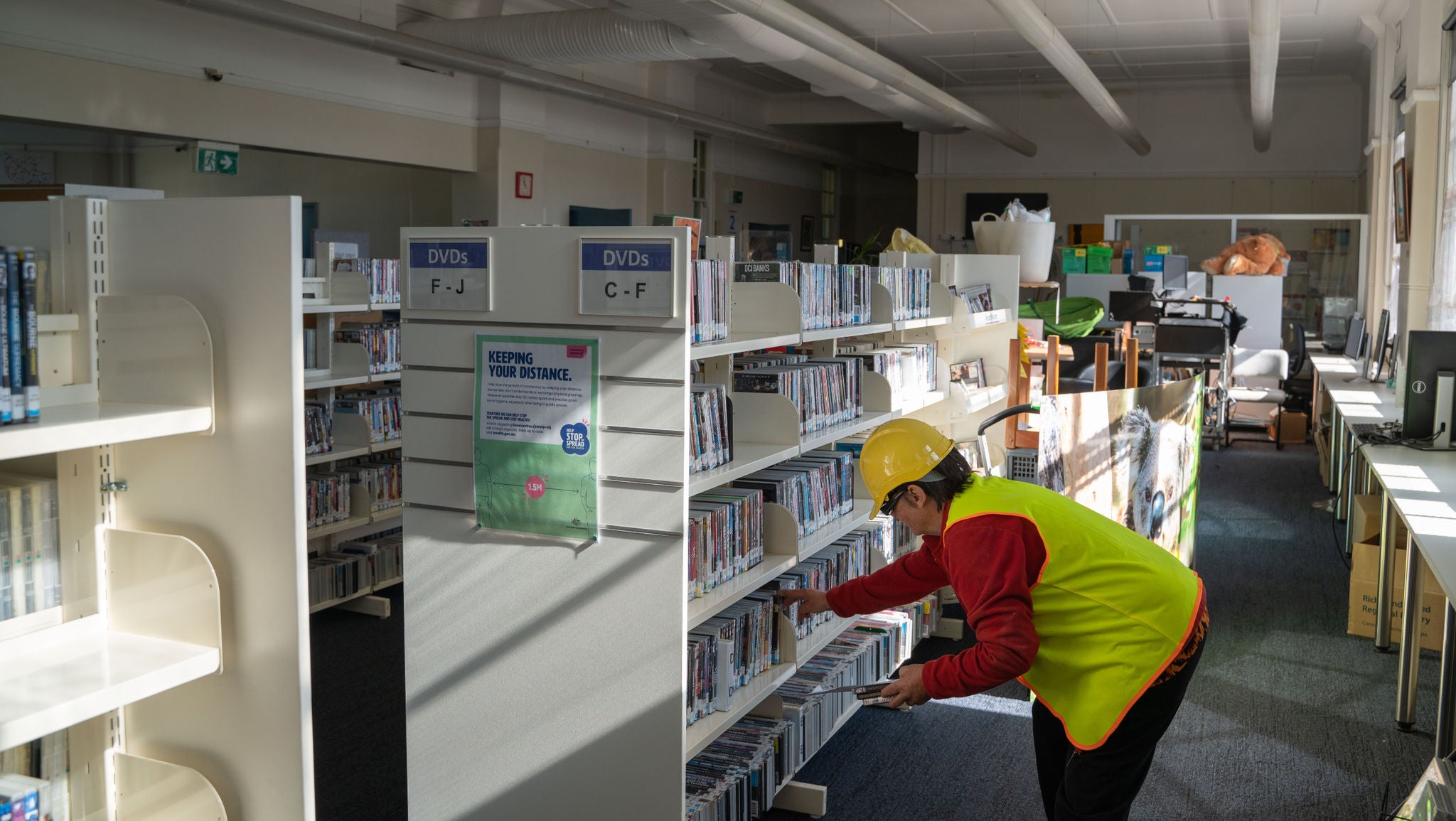 photo-lucy-restocking-shelves-lismore-library