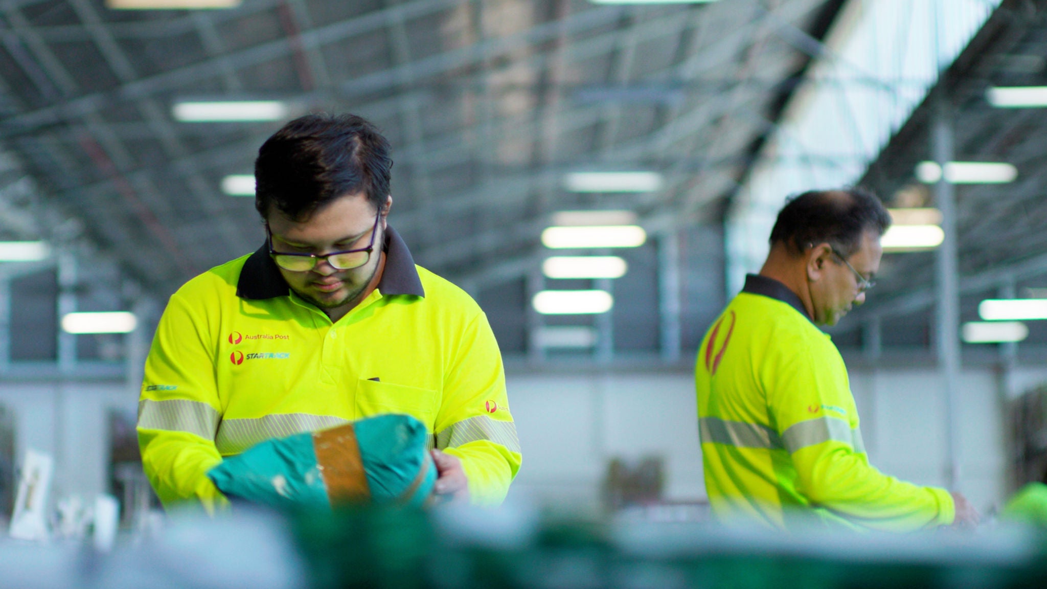 photo-greg-and-michael-working-in-mail-facility