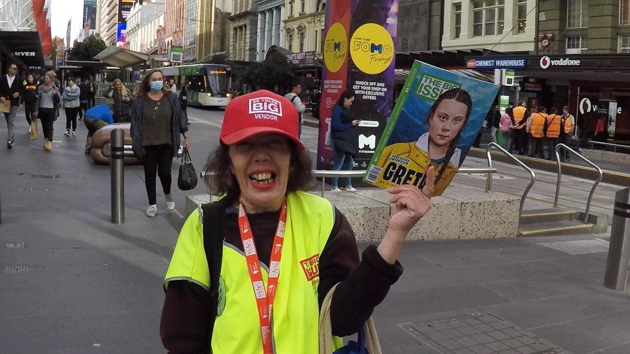female big issue seller