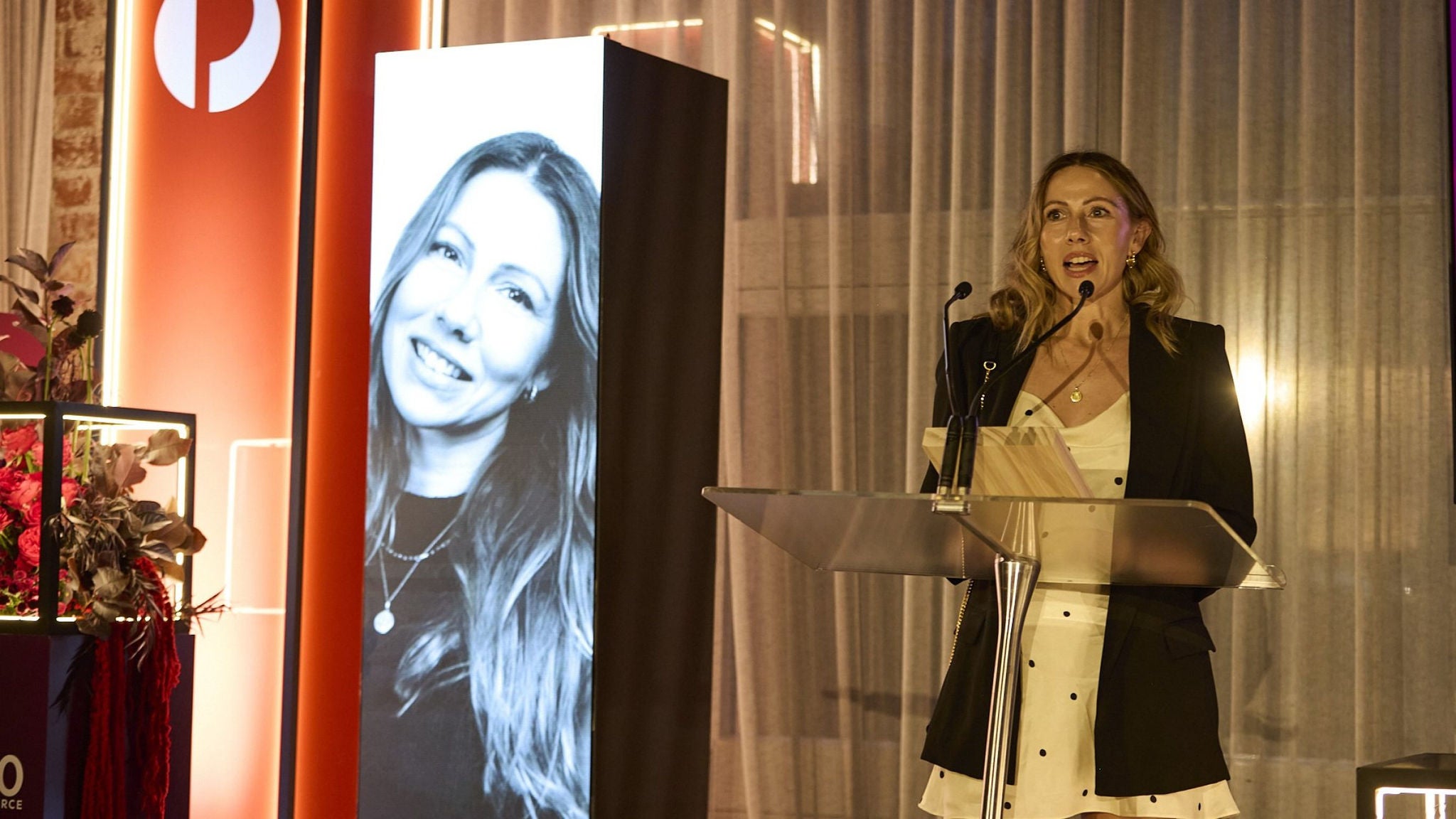Photo of Heather Earl speaking at Podium