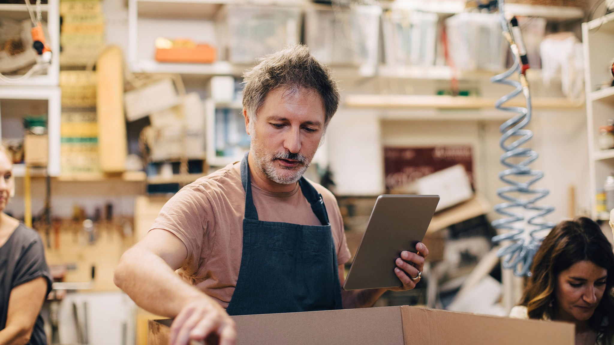 photo-regional-rural-man-getting-mail-from-letterbox-at-sunset