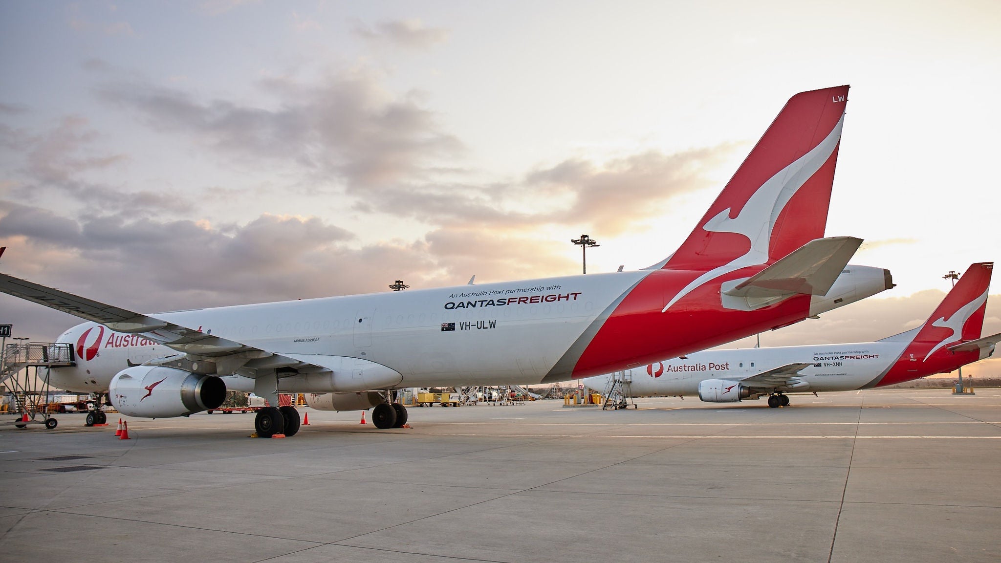 qantas australia post freighter plane on tarmac
