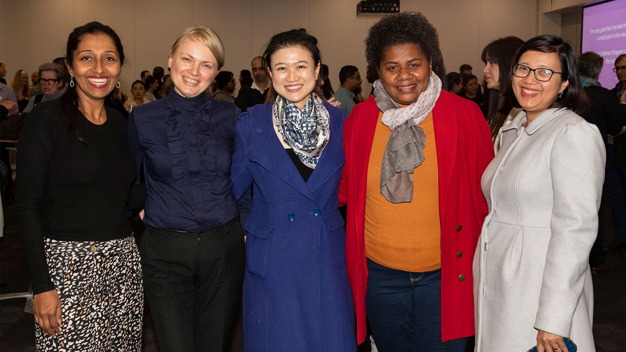 photo-four-women-dressed-corporate-wear-event